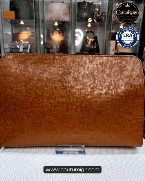 Burberrys – Brown Embossed Leather Clutch Bag