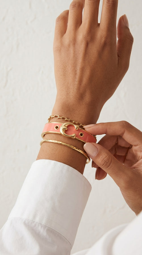 Coach – Enamel Hinged Bangles with Gold‑Tone Hardware